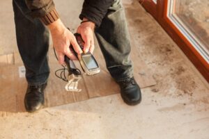 man checking levels on phone