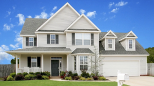large white home with green grass