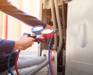 person analyzing HVAC machine