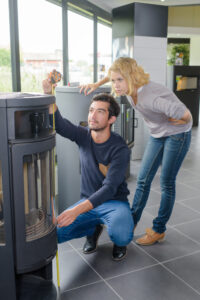 man and woman sizing furnace
